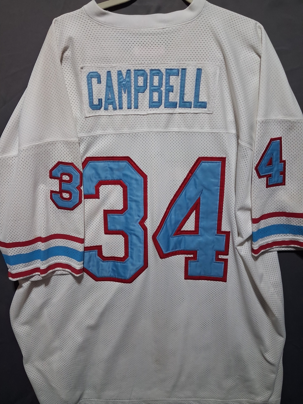 Mitchell & Ness EARL Campbell #34 Mesh Jersey with Light Blue and Red Trim